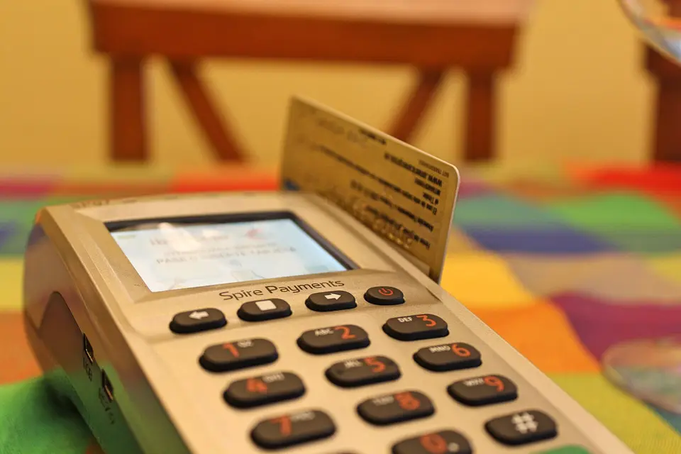 Card payment terminal on a shop counter, ready for contactless payments